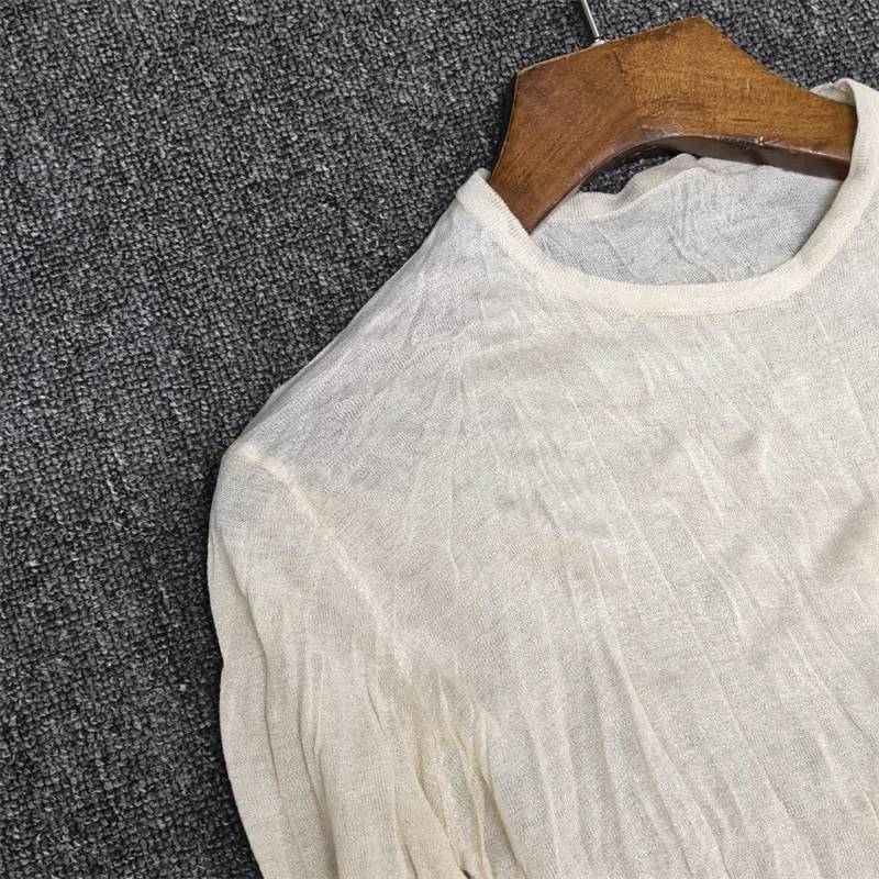 Immagine 5: Abiti casual da donna: Nuovo vestito lungo slim fit girocollo per l'estate 2026, in maglia elasticizzata che avvolge i fianchi, perfetto per le vacanze.