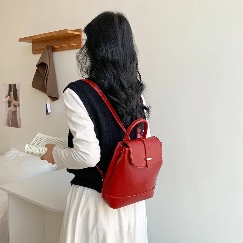 

Korea Dongdaemun fashion simple large-capacity shoulders backpack pure color retro style commuter PU texture shoulder bag