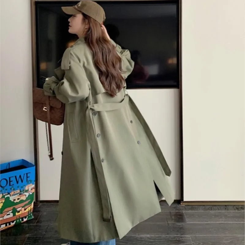 The new women's wear design features a long trench coat and loose large-sized double-breasted for women