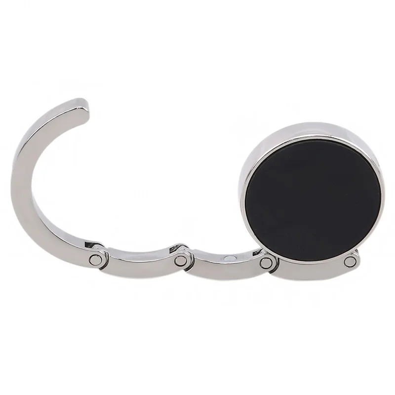 Gancho de mesa plegable para bolso de mano, colgador de mesa, accesorios únicos, portátil, a la moda