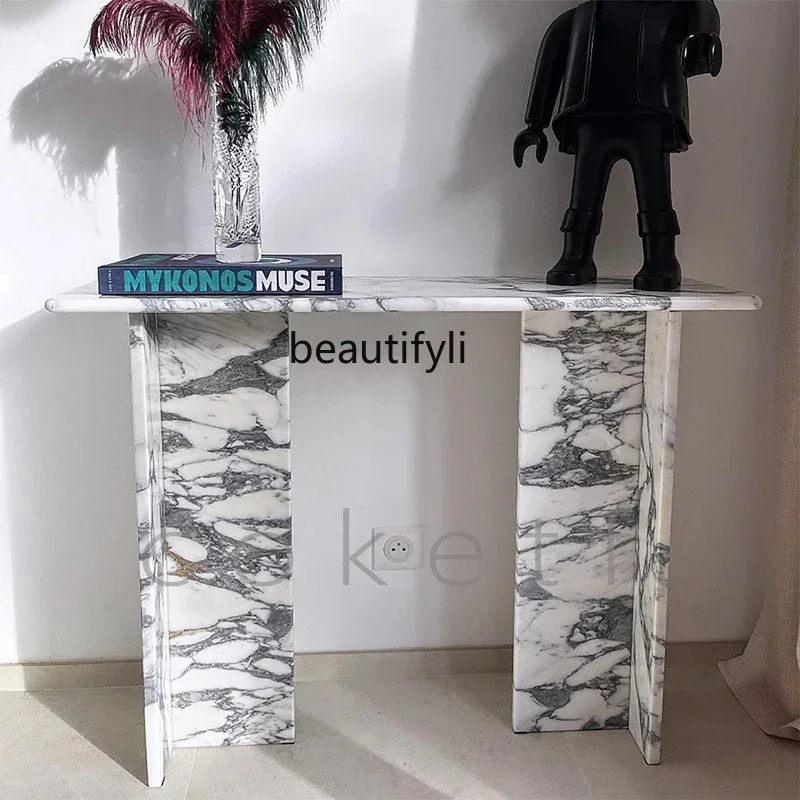 

xxqDesigner high sense natural white marble villa living room against the wall entrance table