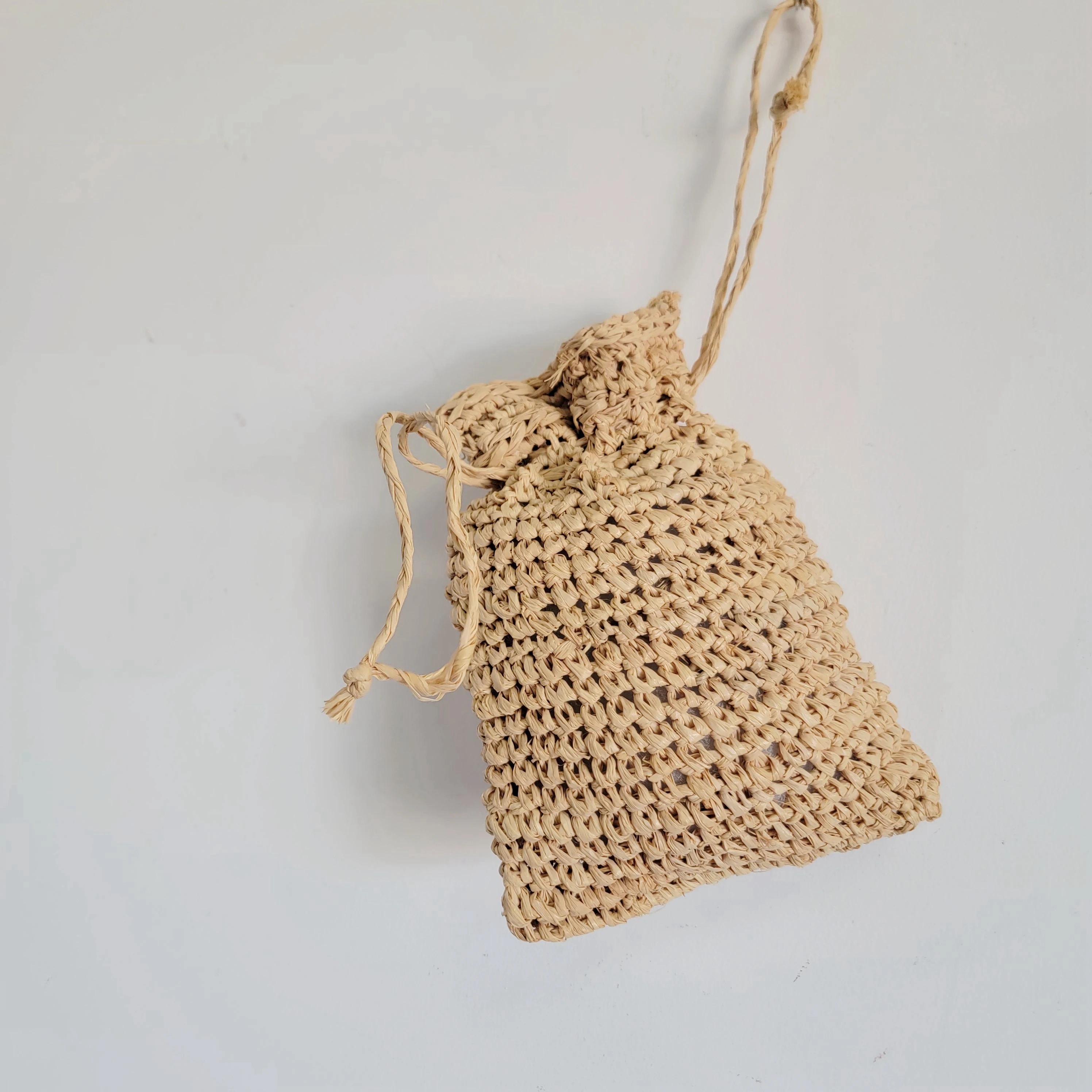 Picture 7: RAFFIA storage bag- drawstring bag