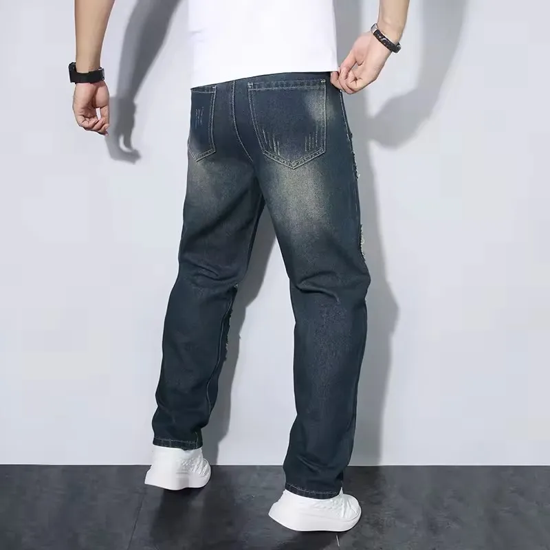 Celana Jeans Kaki Lebar Pria Celana Lurus Merek Trendi Celana Jeans Gaya Baru Sobek Pengemis Celana Panjang Reguler Pria Nyaman Sejuk