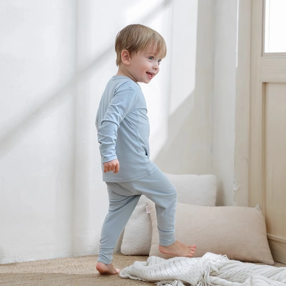 أطقم بيجامات للأطفال لعام 2025 ملابس من ألياف الخيزران مجموعة ملابس نوم عالية المرونة قابلة للتنفس لبدلة ملابس للاستلقاء للأولاد والبنات من 1-7T #1