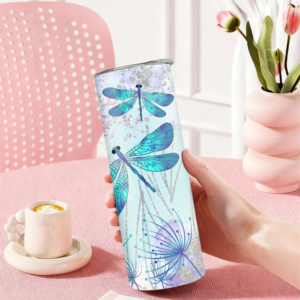 1pc 20oz straw water bottle, insulated stainless steel water cup with a blue dragonfly pattern against a dreamy background.