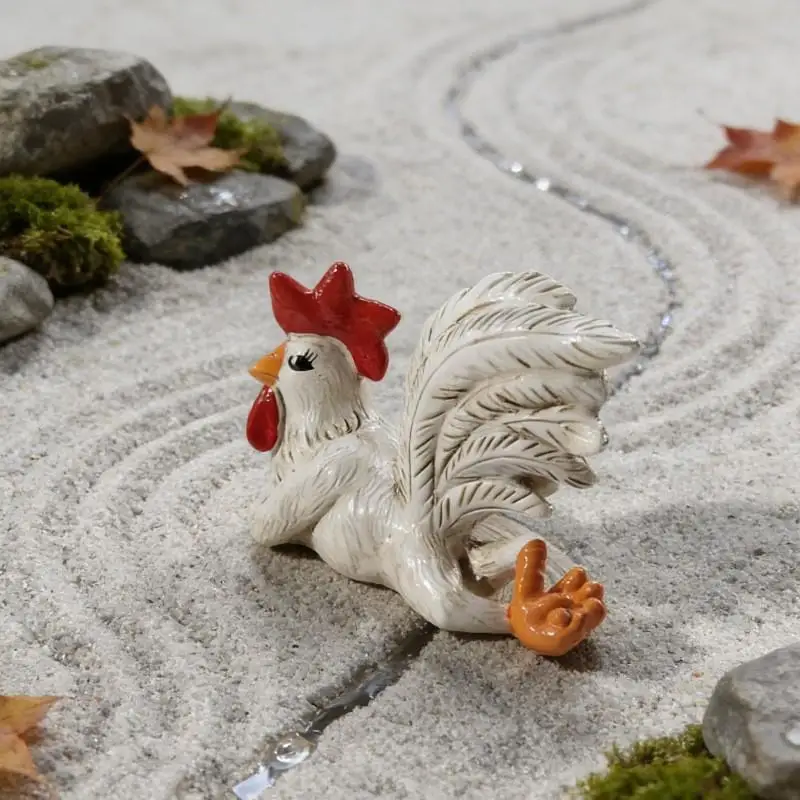 A white rooster statue, charming pose, long eyelashes, tabletop art sculpture, comical small resin sculpture.