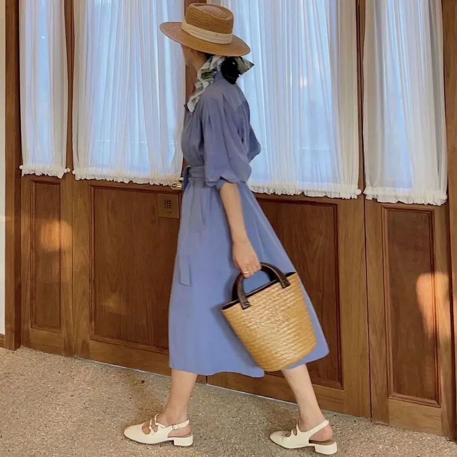 New Handmade Woven Hollowed Out Large Capacity Bucket Type Women's Handbag New Summer Seaside Vacation Straw Woven Bag For Women