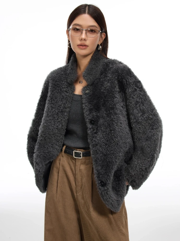 Giacche in shearling di pelliccia di agnello di lusso di fascia alta per le donne 2025 Nuovo semplice cappotto in peluche di pelliccia vera pelle a doppia faccia