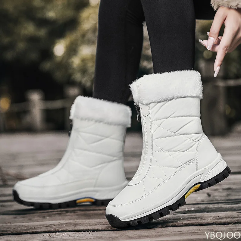 Winter cotton padded thick warm windproof and anti-skid snow boots outdoor thick soled round toe zipper short tube women's boots