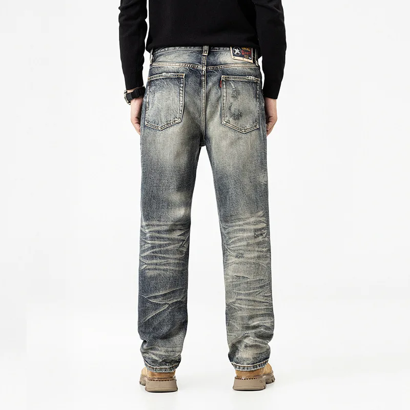 

Мужские джинсы с царапинами и рваными джинсами осенью 2023 года, свободные прямые брюки, модные уличные ретро и ностальгические элитные винтажные брюки.