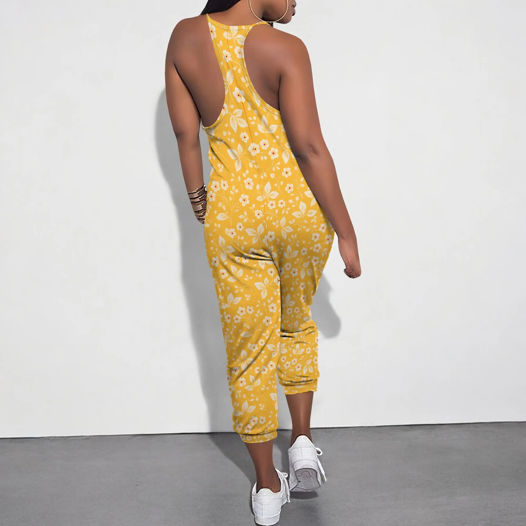 Estate nuova tuta da donna elastica allentata stampata multicolore con scollo a V profondo senza maniche tracolla sottile con tracolla e tasca