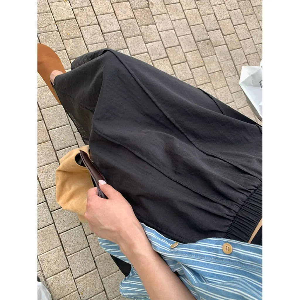 

Women's Large Swing Skirt by Huang Zheng Staggered Waist Solid Color Summer Elegant Comfortable Breathable Long Skirt