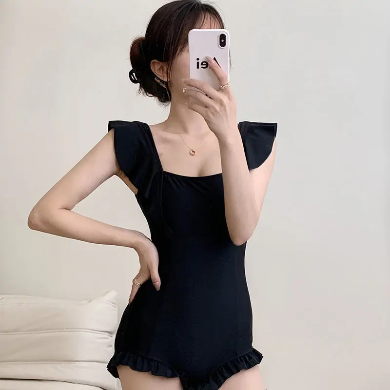 New Swimsuit Women's Solid One-piece Slimming and Hiding Belly Sexy Backless Pure Desire Beach Vacation Hot Spring Swimming Suit