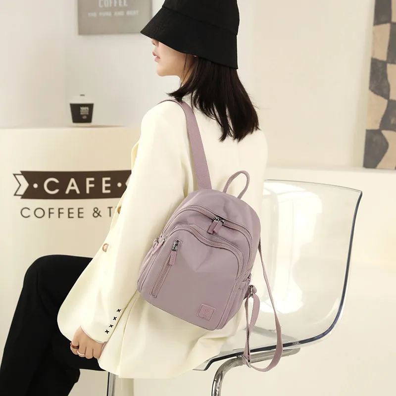 sac-a-dos-leger-en-tissu-oxford-a-double-bandouliere-pour-femme-ideal-pour-les-voyages-les-trajets-quotidiens-et-les-activites-de-plein-air-–-sac-en-toile-elegant-et-tendance-style-navetteur