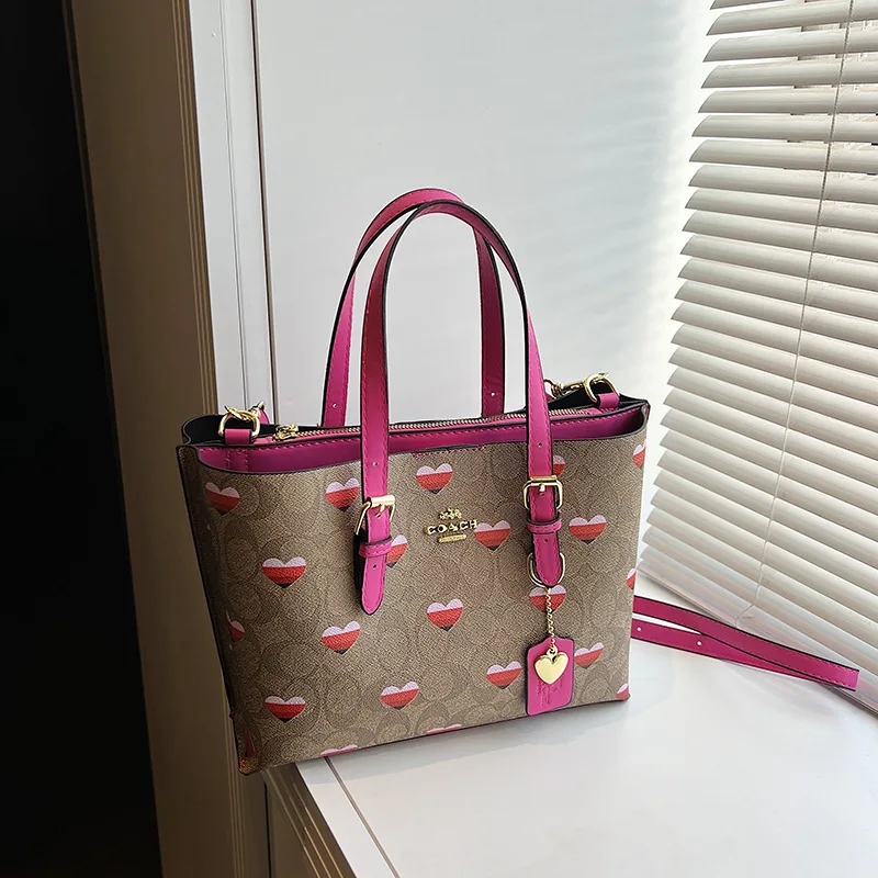 La nuova borsa da donna tote con motivo di marca di lusso del 2025 è una borsa a tracolla monospalla alla moda