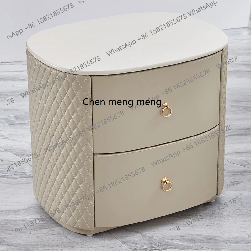 

Light luxury solid wood bedside table rock slab oval bedside table American bedroom leather storage cabinet