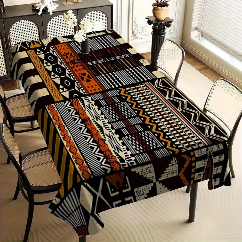 One exquisite tablecloth, featuring a collage of African traditional patterns in printed form.zyc