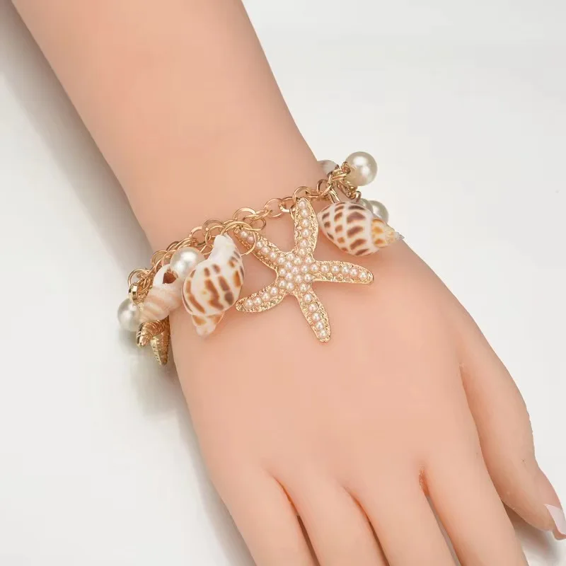 Women’s Gold Starfish & Seashell Charm Bracelet, Elegant Beach Jewelry with Faux Pearl, Summer Vacation Accessory image 5