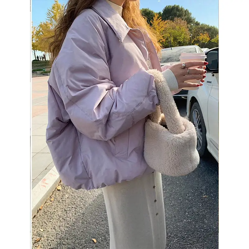 Chaqueta acolchada de algodón de estilo corto púrpura popular para mujer, abrigo holgado de ocio corto de invierno, nuevo modelo, etéreo de moda