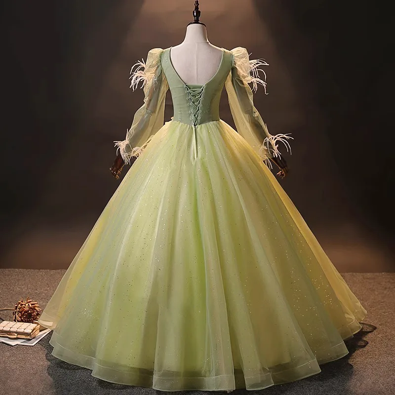 Luxury Light Green Quinceanera Dress with Feathers Long Sleeves Beaded 3D Flower Applique Princess Floor Length Formal Ball Gown