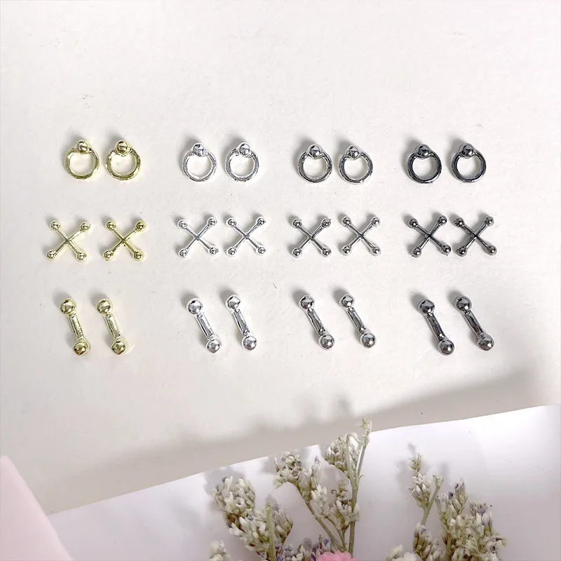 40PCS Retro Punk Style Hollow Hanging Rings X Cross Bone Rod Alloy Nail Art Rhinestones Decorations Manicure Charms Accessories