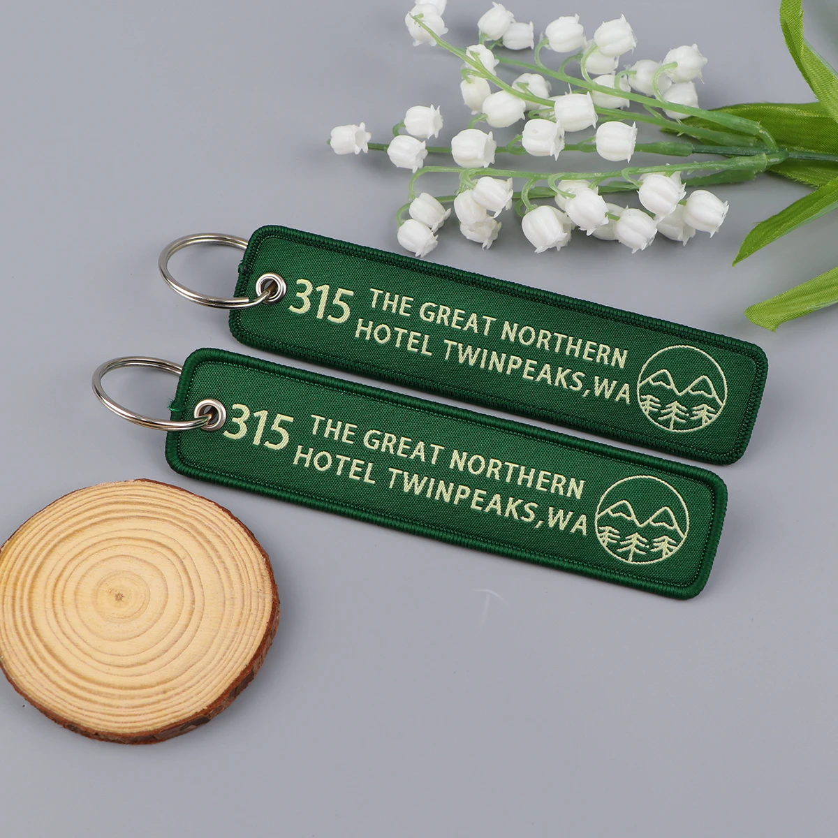 Beberapa penawaran seri bordir kunci cincin Tag bagasi untuk penerbangan gantungan kunci untuk mobil sepeda motor kunci Aksesori liontin