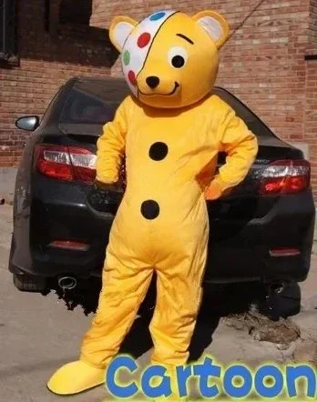 

Disney One Eyed Pudsey Bear Mascot Costume Cartoon Yellow Bear Doll Fancy Suits Halloween Christmas Birthday Party Outifts Acces