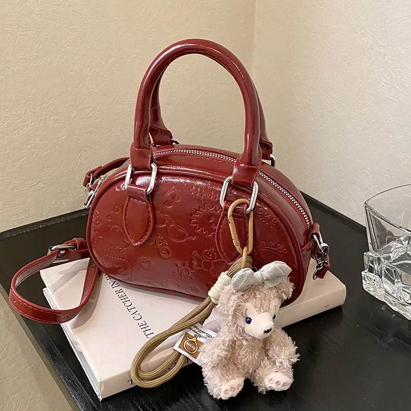 

New in 2025 Ladies' High sense PU Messenger Bag - Niche Design, Cute Printed Portable Boston Bag for Effortless Casual Commuting