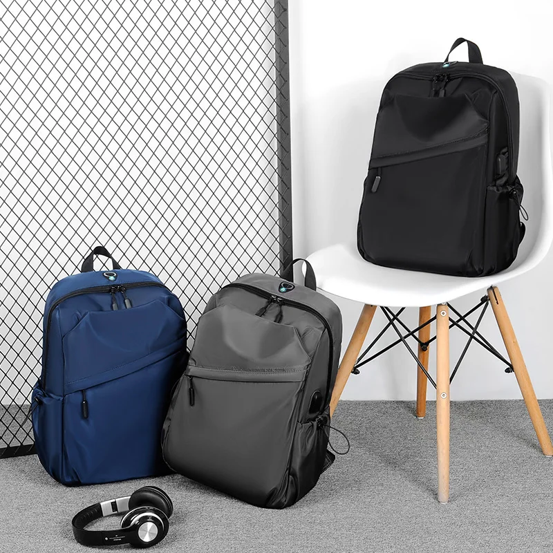 

Casual backpack high-end USB charging simple and fashionable computer backpack junior high school student schoolbag large ca