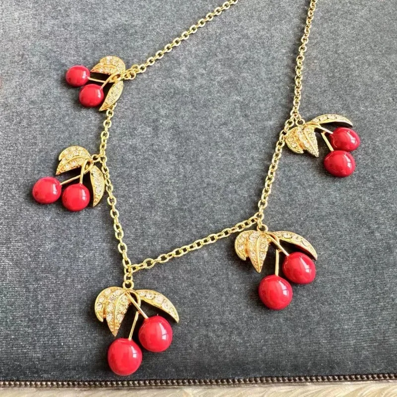 

New Autumn Winter Fashion Sweet Style Hand-painted Enamel Glaze Red Fruit Charms Rhinestone Leaf Pendant Necklace Sweater Chain