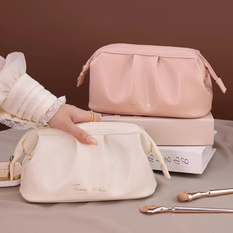 Brand Design: PU Waterproof Makeup Bag, Large Capacity Storage Bag, High-End Feel. Hand in Hand to Take the Bag When Traveling