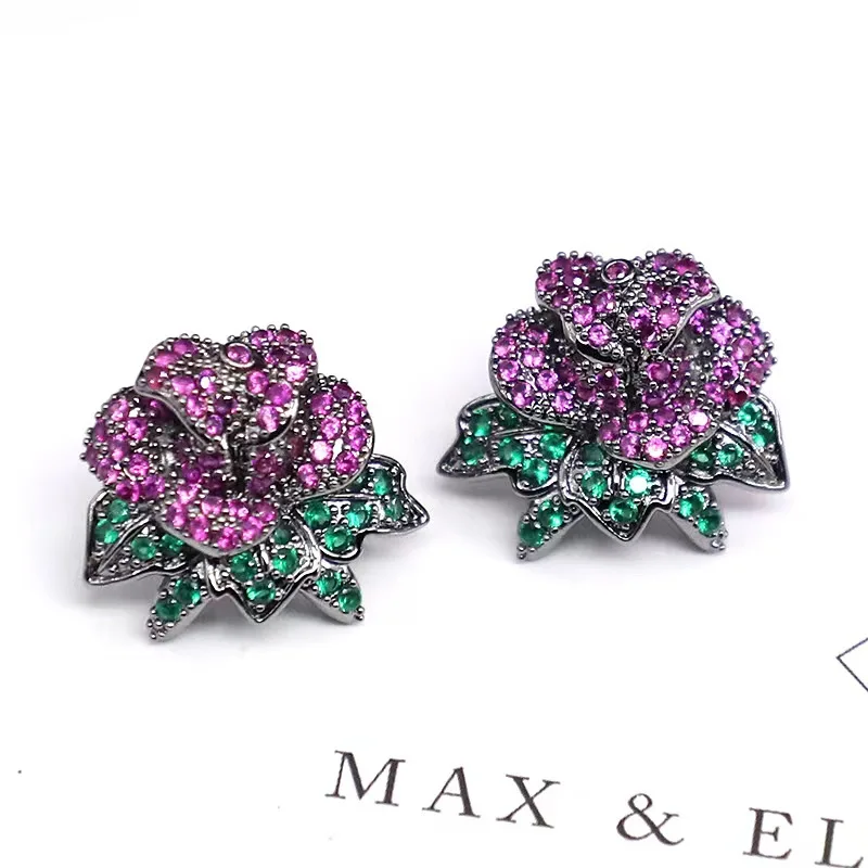 

New women's Japan and Korea upgraded ins camellia flower earrings niche versatile silver needle earrings