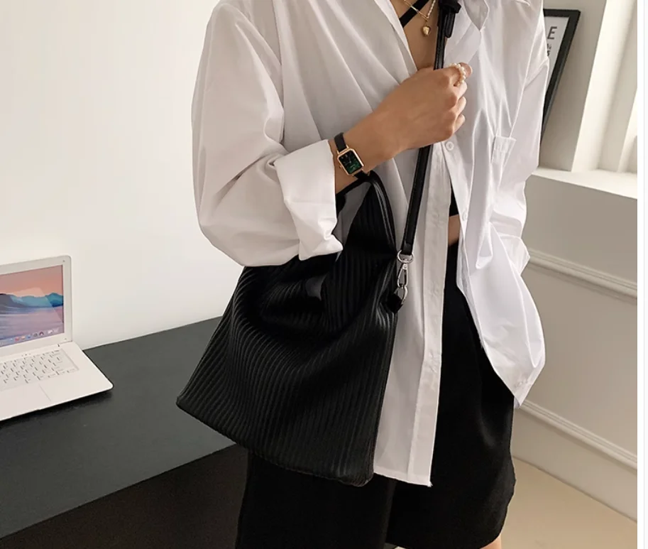 IN STOCK Miyake High-end pleated twilight One shoulder solid veiled button PU bag pleated bag HOT SELLING