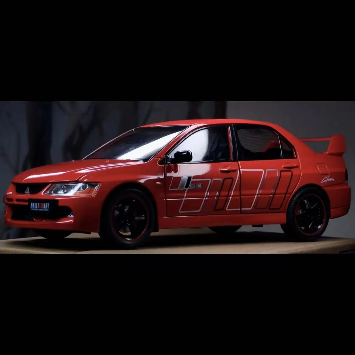 

1: 24 Mitsubishi EVO9 brushed edition alloy sound and light car model, children's toy bedroom decoration, high-end collection