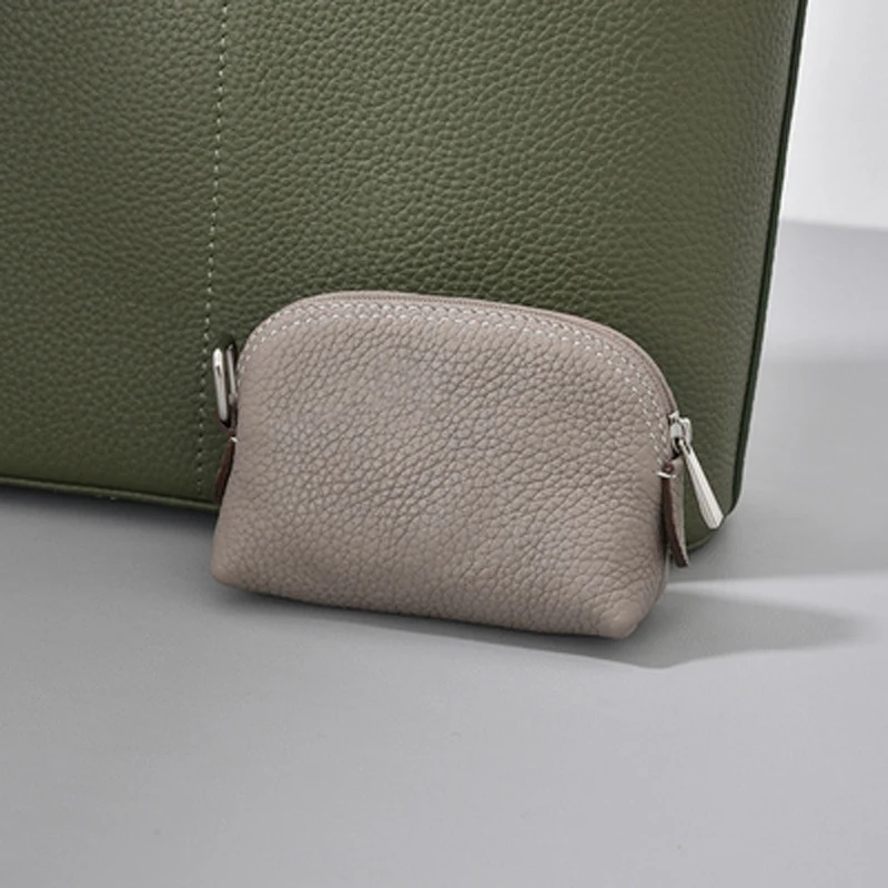 2022 new women's earphone bag pendant bag leisure first layer cowhide Mini credit card bag mouth red envelope