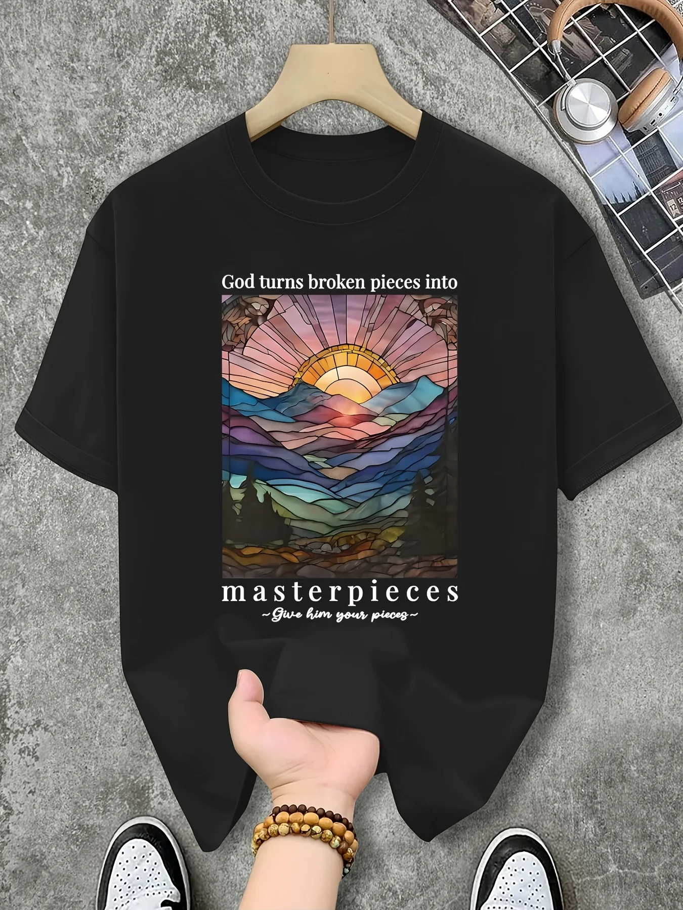 Men's T-shirt featuring a magnificent and colorful image of a sunrise and mountains, showcasing how God transforms broken pieces into masterpieces. Available in white, it's perfect for use as a patterned T-shirt. Vintage casual round-neck printed T-shirt