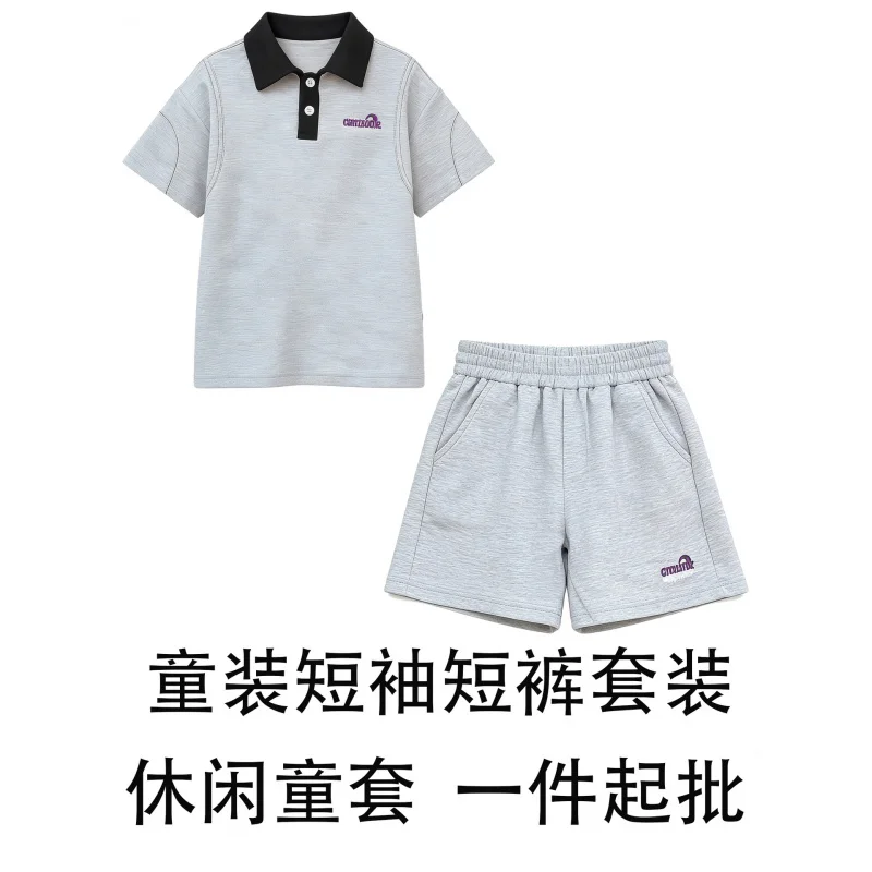 

Girls' clothing setvCasual two-piece shirt set with a stylish look2026Loose-fitting short-sleeved shirt and shorts