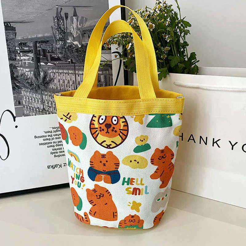 Canvas bento bag, handheld lunch box bag, portable cute animal pattern graffiti bucket bag, printed cylindrical bag