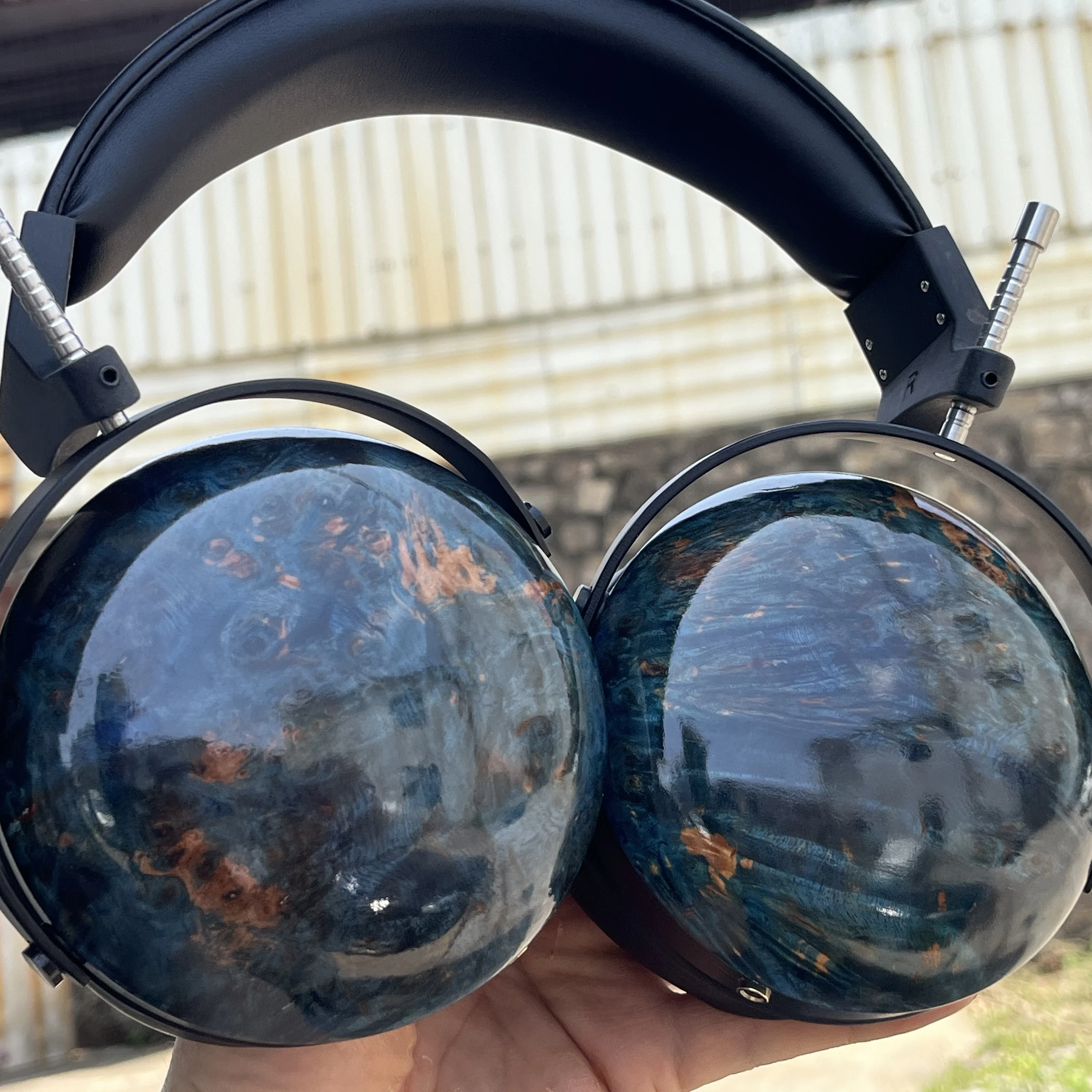 High-fidelity Closed-back Headphones with Unique Stabilized Wood Shells, Offering Immersive Sound, Durable Build, and Stunning