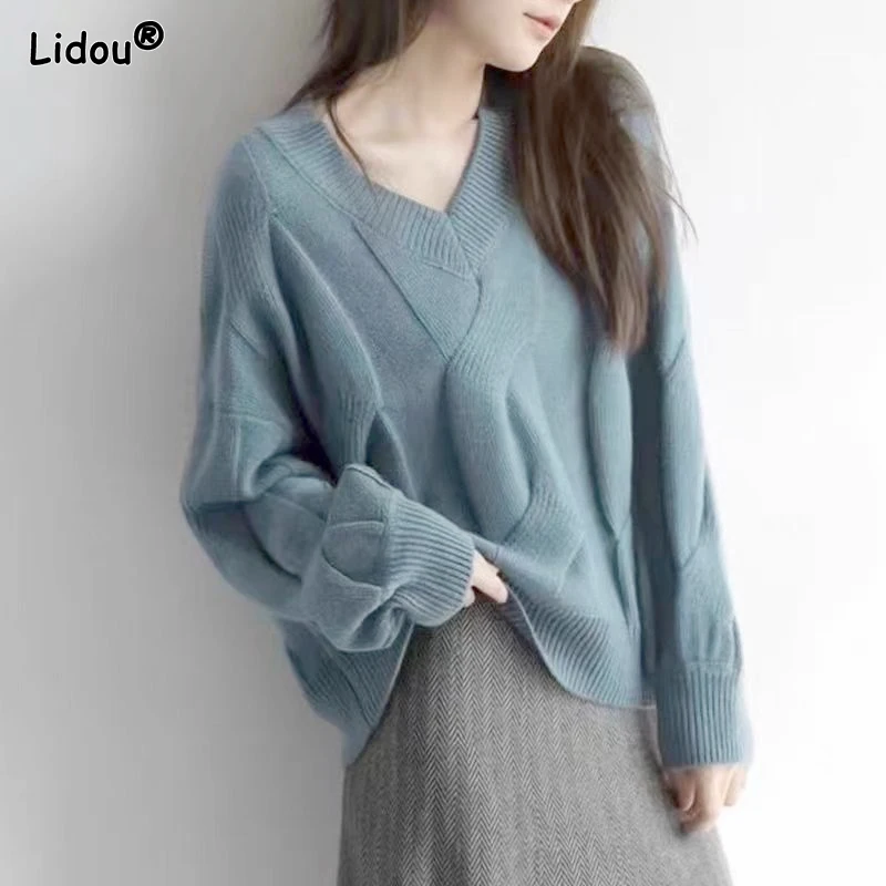 

2023 Autumn and Winter Simple and Lazy Relaxed V-neck Jacquard Fashion Knitted Pullover Women's Solid Color Long Sleeve Sweater