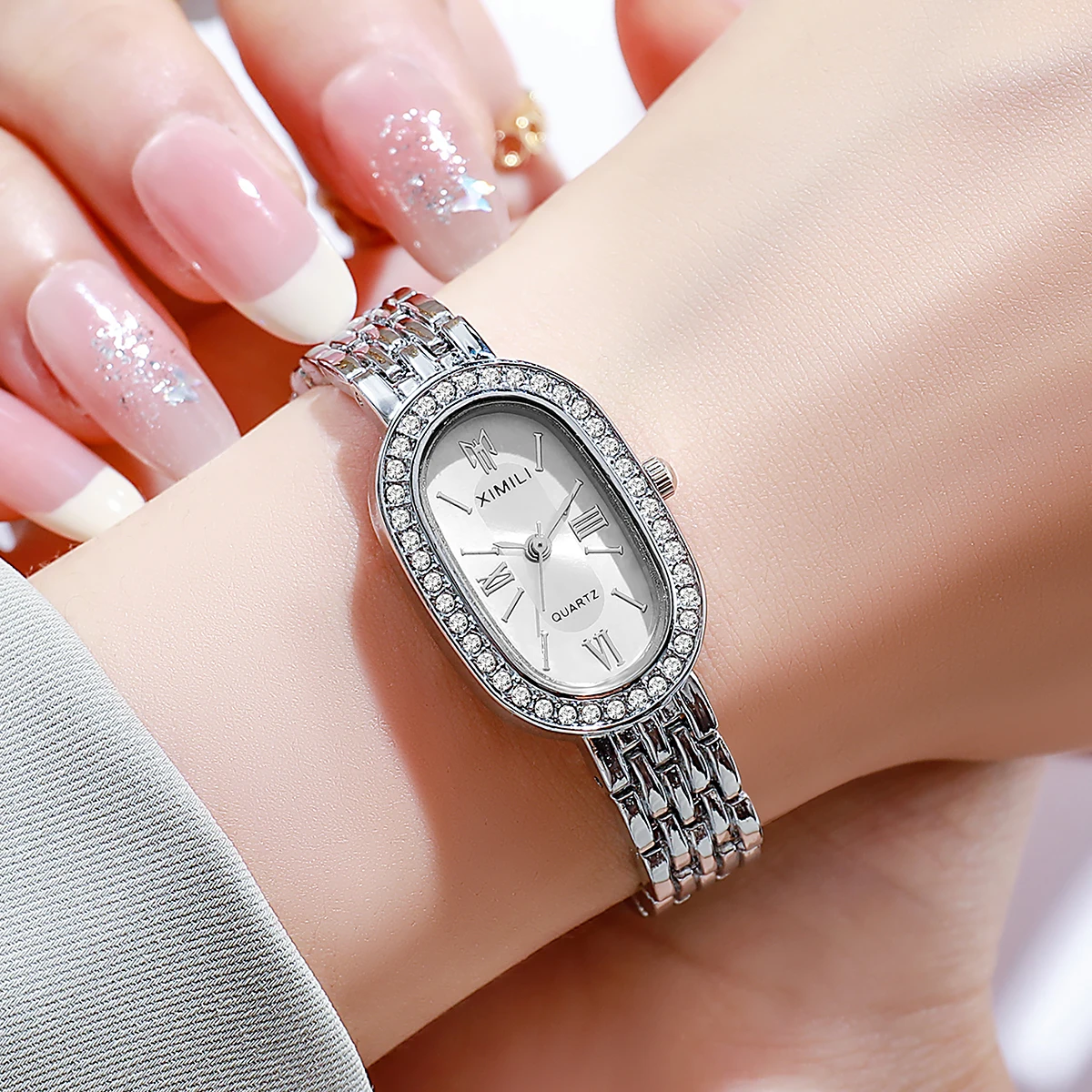Cross border new minimalist casual fashion oval alloy steel strip with diamond inlaid bracelet for women's quartz decoration wat