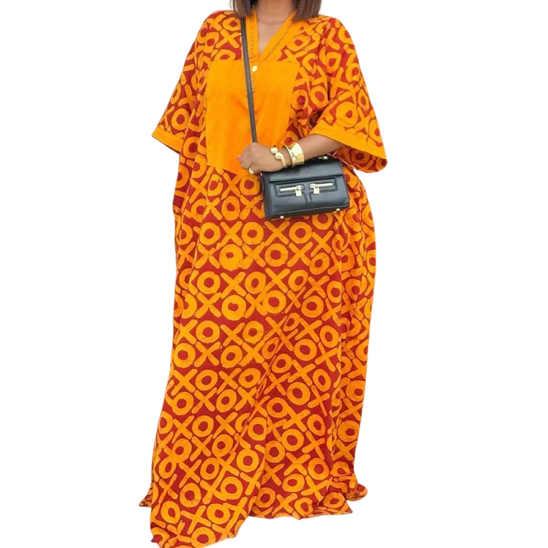 

Classic African printed gown suitable for adult ceremonies and formal occasions, exuding elegance and tradition