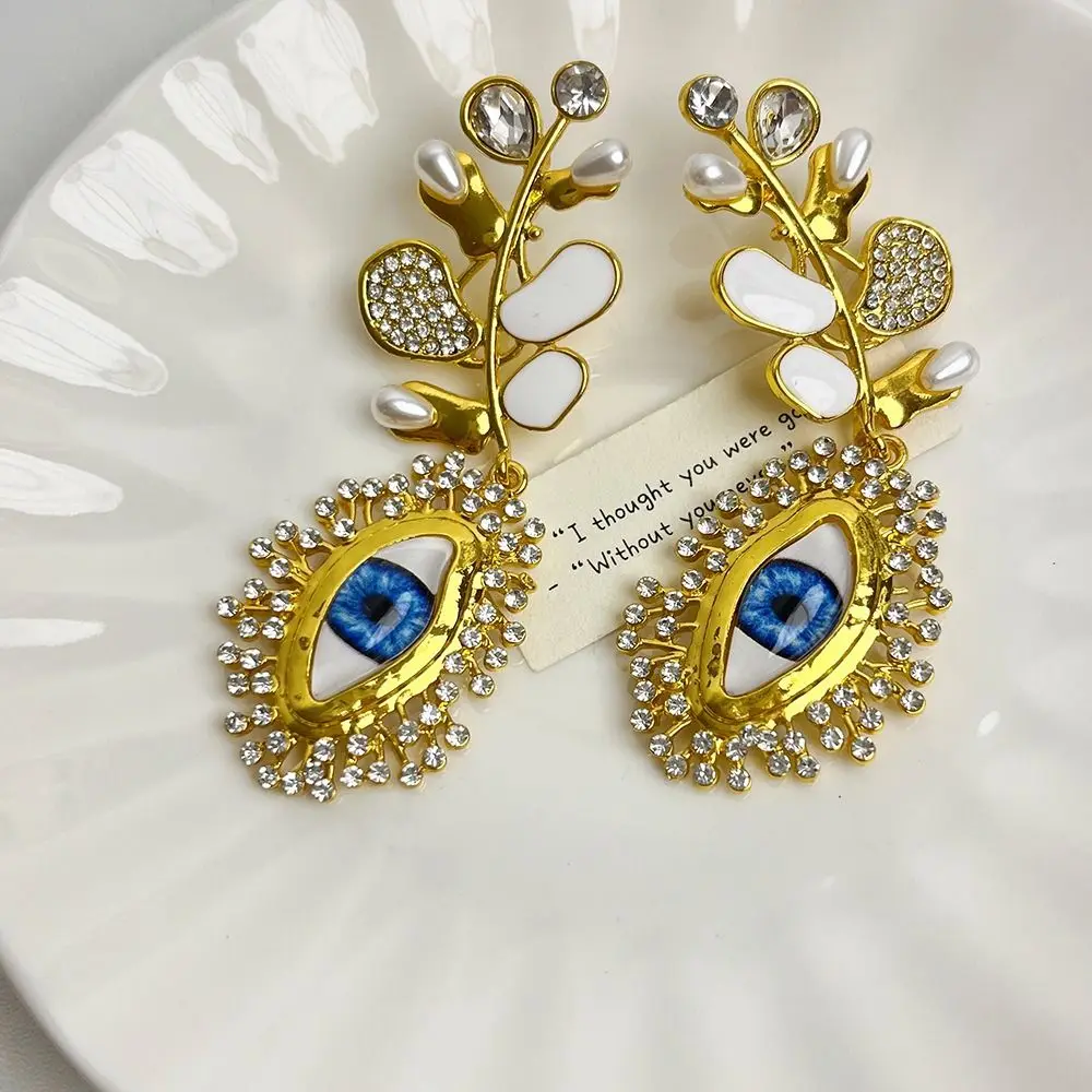 

Aesthetic Pearl Eyes of Demon Stud Earring Exaggerated Vintage Devil's Eye Earrings Delicate Tassels Women Stud Earrings Holiday
