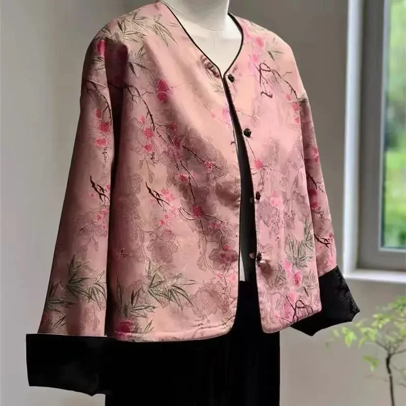 Giacca jacquard in raso floreale alla moda da donna Cappotto corto nero di fascia alta da donna Top larghi su due lati in stile cinese