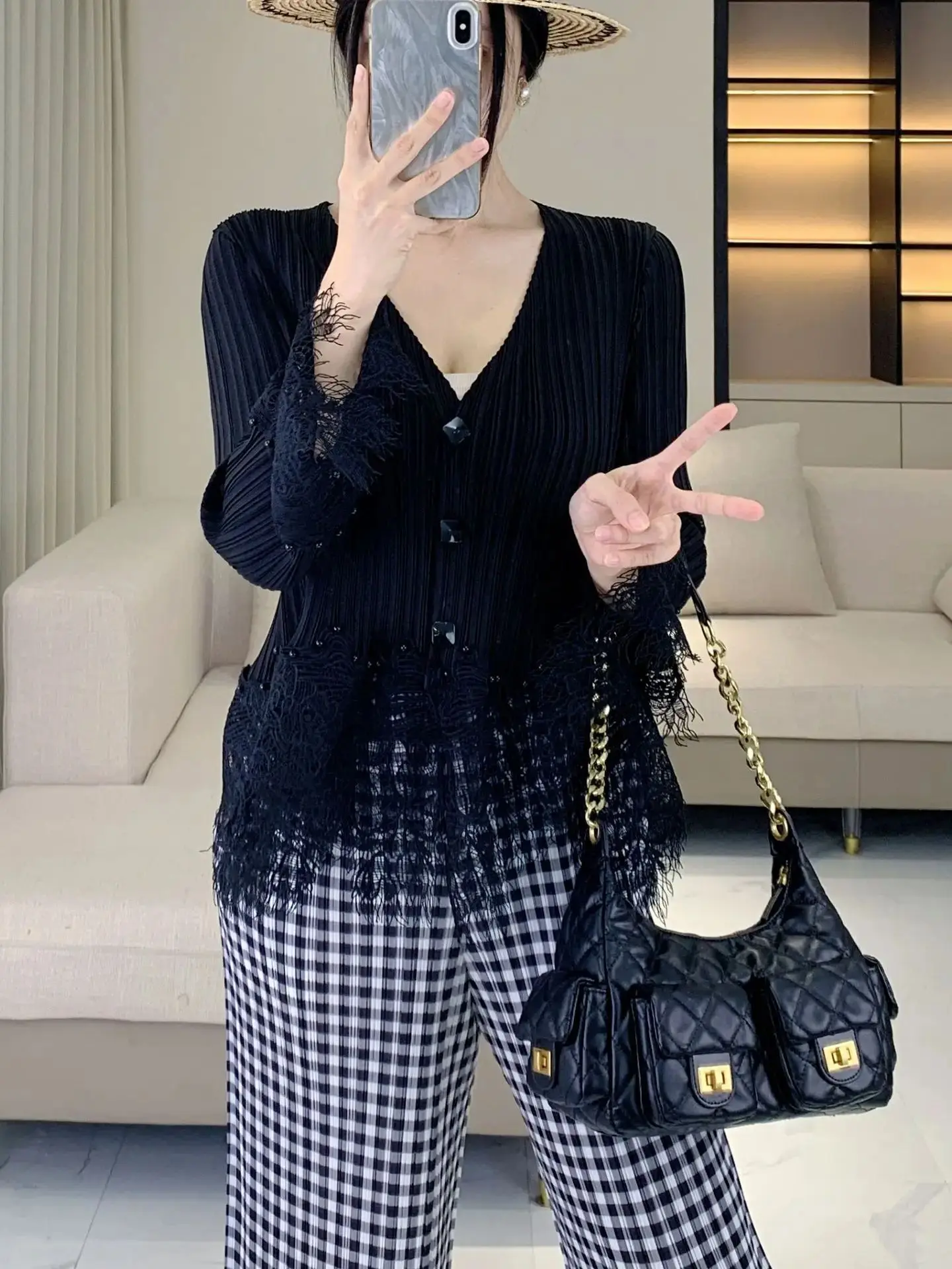 Elegant and stylish lace cardigan for women with a sophisticated and mature style, featuring a V-neck and patchwork design