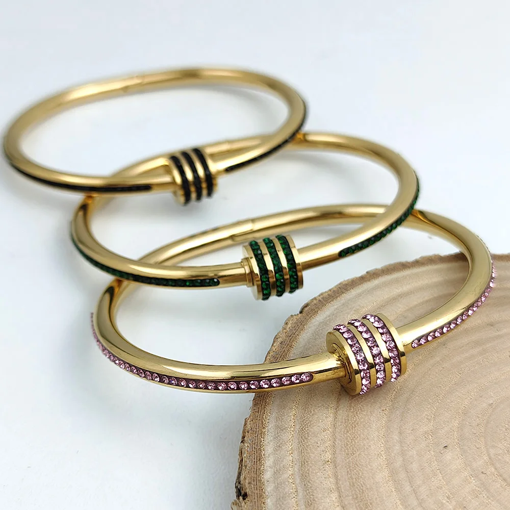 

Metal lady's bracelet. Closed cylindrical glittering zirconia bracelet. Fashionable wedding party jewelry for your wife.