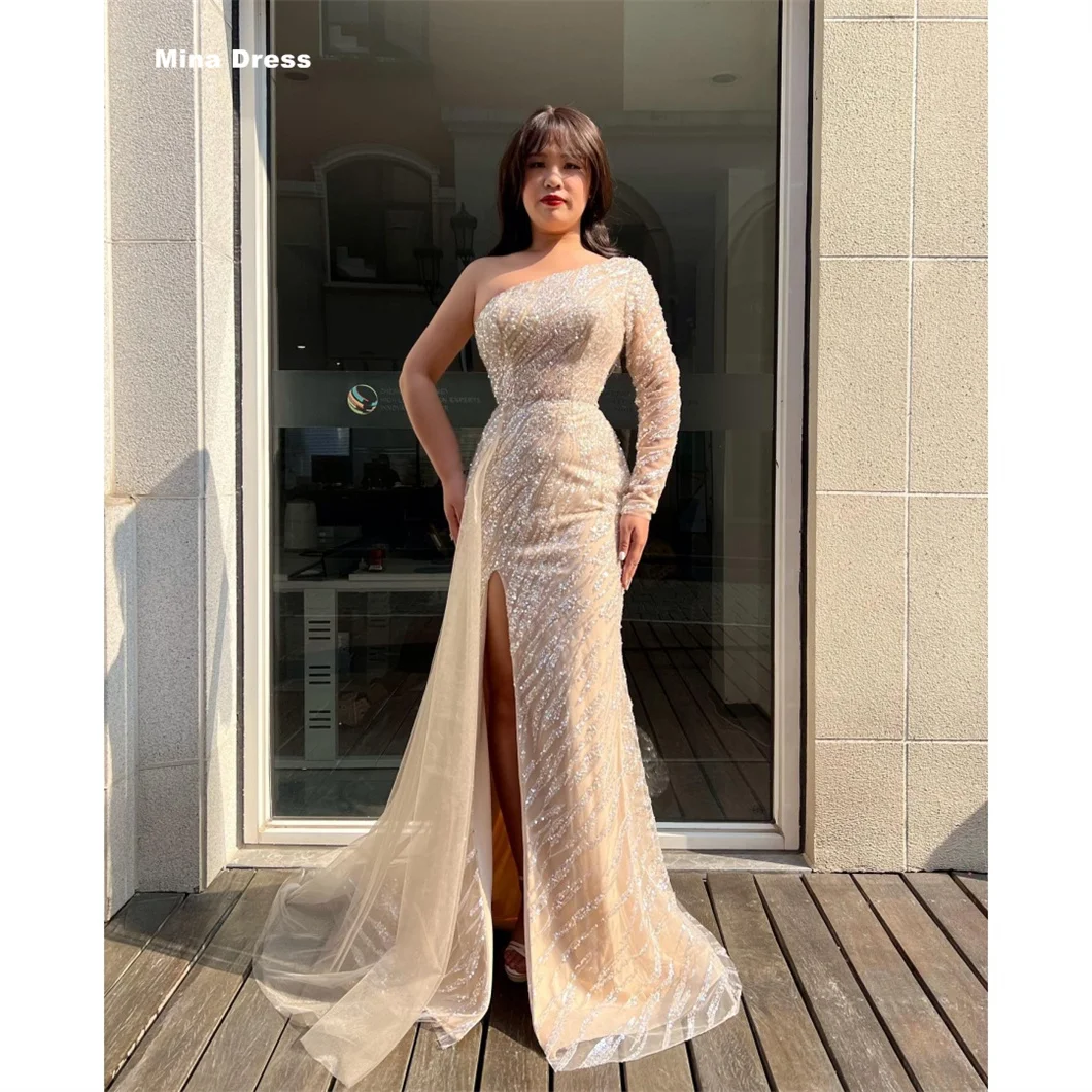 Mina custom-made beaded gowns, perfect for special occasions, adorned with sequins. Long-sleeved evening gowns, luxurious and el