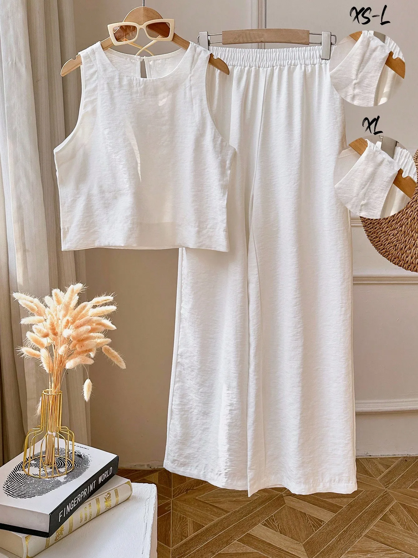 

Женский комплект из 2 предметов: укороченный топ без рукавов и широкие брюки, однотонный белый цвет