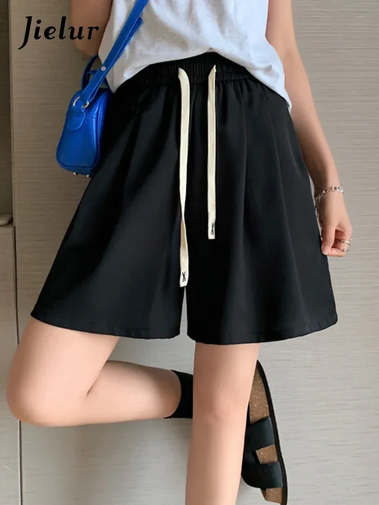 Jielur الصيف الرباط ضئيلة لون نقي السراويل النسائية عالية الخصر طول الركبة عارضة الشارع الشهير جيوب أسود أصفر فاتح السراويل