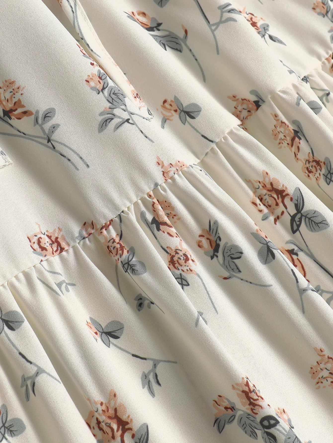 Damska spódnica midi o długości do kostek, w kwiatowy wzór, idealna na wiosnę i lato, z elastyczną talią i zwiewnym krojem.